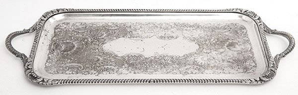 Double Handled Silver Fish Tray: Ornate silver on coper with etched floral, leaf and shells to center. Ribbed handles and gadroon borders with embossed shells, acanthus leaves, and flowers. Manufacturer mark to underside. Size