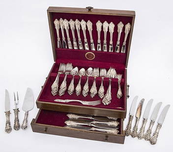 Large Wallace "Grand Baroque" Sterling Flatware: Large set of flatware including 12 dinner knives, 15 dinner forks, 13 salad forks, 5 shrimp forks, 21 teaspoons, large dressing spoon, large vegetable server, large meat fork, total pieces to set 69.