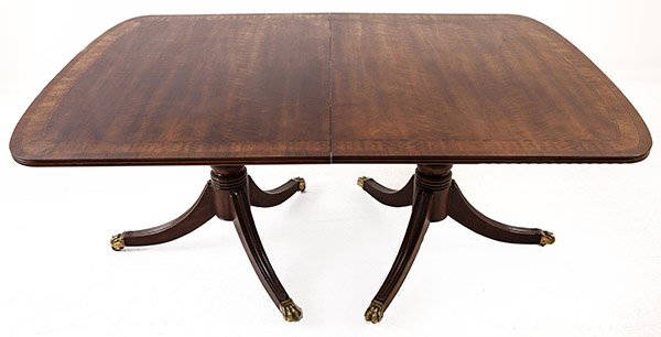 Mahogany Dining Table: Satinwood band inlaid, double pedestal dining table, three twenty-two inch leaves. Size 134" long x width 45 height 28 1/2". (68 inches when closed) ******Please Note we have complete set of table