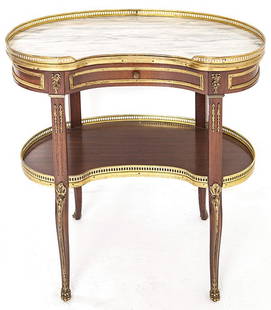 Marble Top Table: French, two tier, marble top. Brass galleries, center drawer, ormula trim. 1900's Size 16 1/2d 27w x 30h