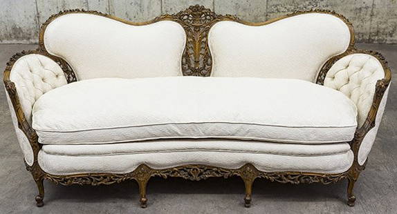 French Art Nouveau Sofa: Heavily carved frame, walnut, tufted back, upholstered size 87w x 38d x 36h
