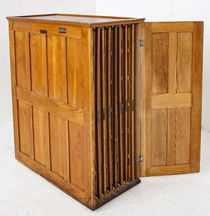 Atlas School Supply Co. Map Cabinet and Maps 1907: Outstanding oak panel cabinet with eight maps, Africa, Canada, Asia, World, United States, South America, North America and Europe Each map is 3 dimensional, in original molded oak frames, 1907 Size