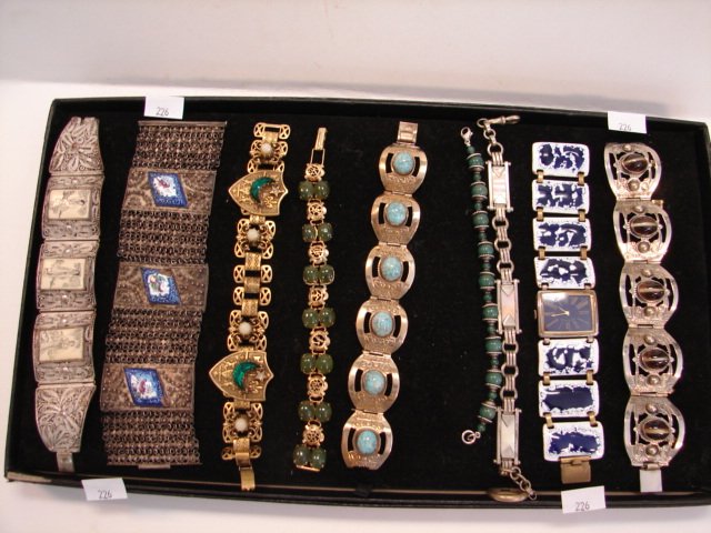 Nine piece bracelet lot: Cats eye, enamel, turquoise, stones and possibly jade