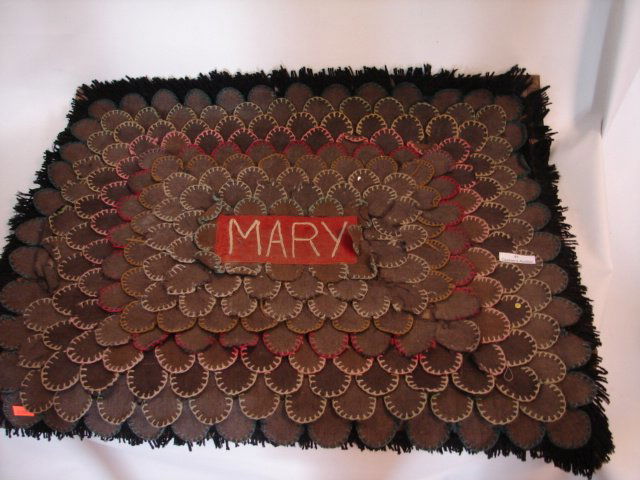 Antique Shoe Heel Rug, Mary: 27 x 23" Marked Mary in chain stitch. Fringe
