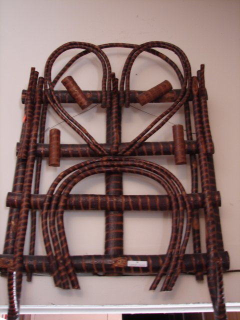 Collectible "Adirondack" Twig Hat Rack: Five pegs, stained bark w/ peeled bark striping. 22" x 34.5" long, mid/late 20th C