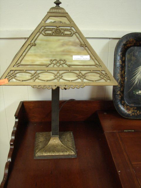 Miller Slag Glass Lamp: White Metal with gold tones. One pane is cracked. 20" high, signed Miller