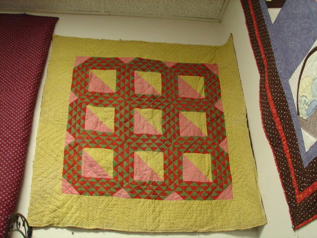 Antique Mennonite Crib Quilt, 1825-1850: Striped backing . Binding never added, but quilt was used. Typ. Pa. colors. 41x43 Hand pieces,quilted.