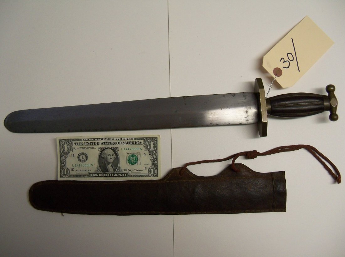 Antique Chinese River Pirates Sword: 19th Century Jian. Boxwood grip with brass mounts and large jian style broadsword blade. Uncommon style with scabbard.William Herbert McGinty Collection. Collected between the late 1800's and early 19