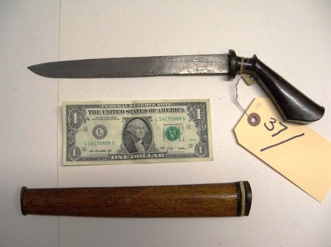 19th Century Indonesian Dagger: Horn grip with eight and half inch blade. Wood scabbard with horn & bone inset. The William Herbert McGinty Collection. Collected between the late 1800's and early 1900's.