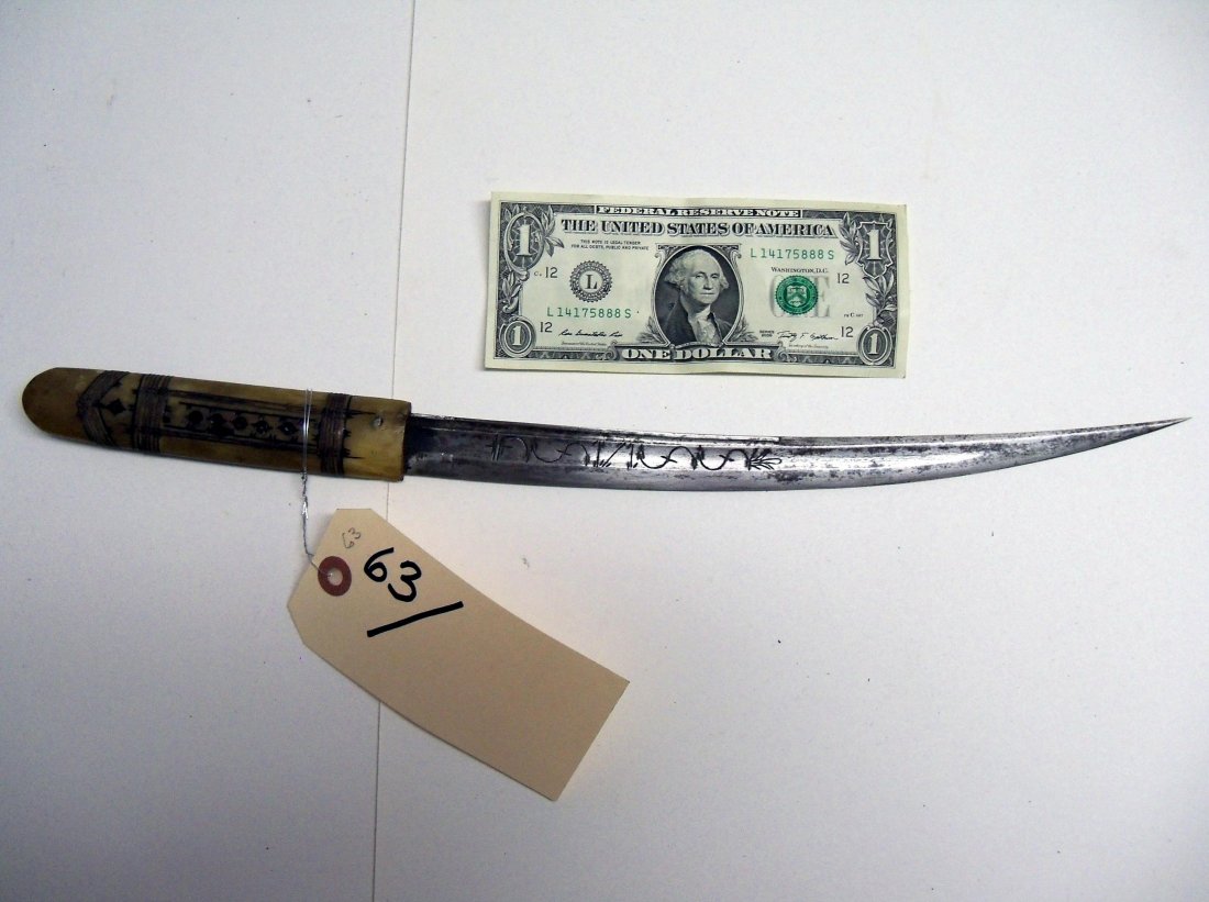 Antique 19th Century North African Algerian Dagger: In the Flyssa style. 11¼ inch blade and camel bone handle are decorated with Berber motifs. William Herbert McGinty Collection. Collected between the late 1800's and early 1900's.¼