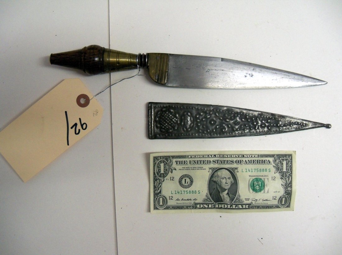Antique 19th Century Spanish Dagger: Handle in the shape of a plug bayonet. 6¾ inch blade.Embosed metal scabbard. The William Herbert McGinty Collection. Collected between the late 1800's and early 1900's.