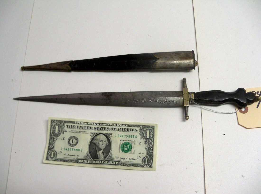 Fine and Rare early 20th C. Philippine General's Dagger: Silver mounted with buffalo horn grip and original leather scabbard. 10 inch engraved blade. Brass crossguard. The William Herbert McGinty Collection. Collected between the late 1800's and early 1900'