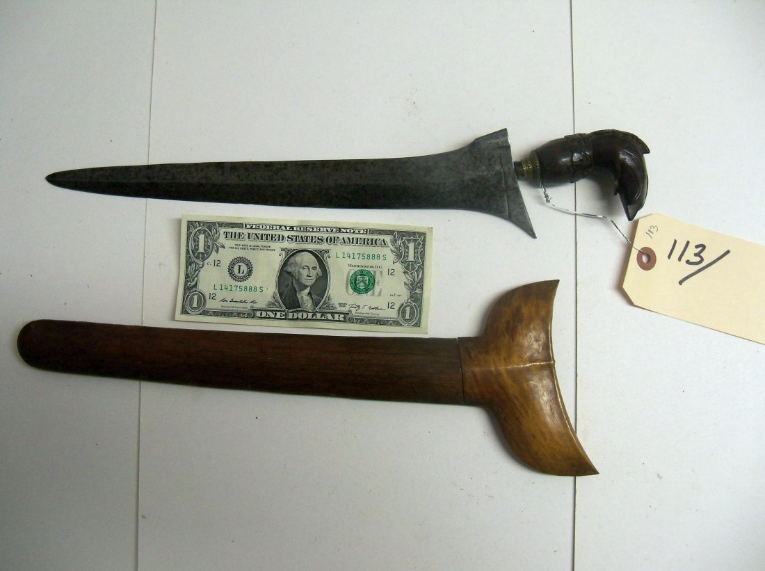 19th Century Unusual Bird Head Kris Dagger: Malaysian or Indonesian. 11½ inch blade, Unusual bird head carving. William Herberty McGinty Collection. Collected between the late 1800's and early 1900's.