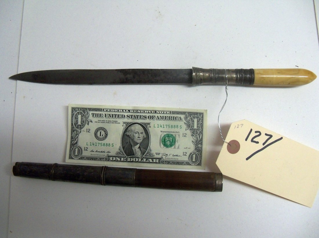 Antique 19th Century Burmese Dha Dagger: The national sword of Burma. Guardless hilt, single edged 8½ inch blade. Hilt is silver? and bone. Nine inch wood and silver? scabbard. The William Herbert McGinty Collection. Collected between the l