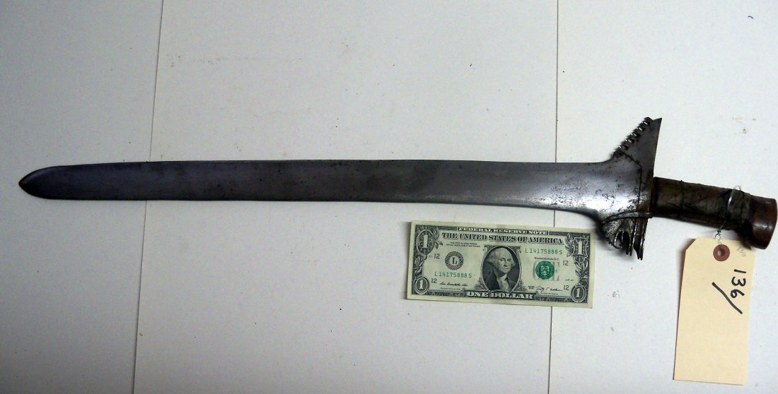 Fine 19th Century Philippines Moro Kris Sword: 21½ inch straight blade. Taped grip, wood pommel. William Herbert McGinty Collection. Collected between the late 1800's and early 1900's.