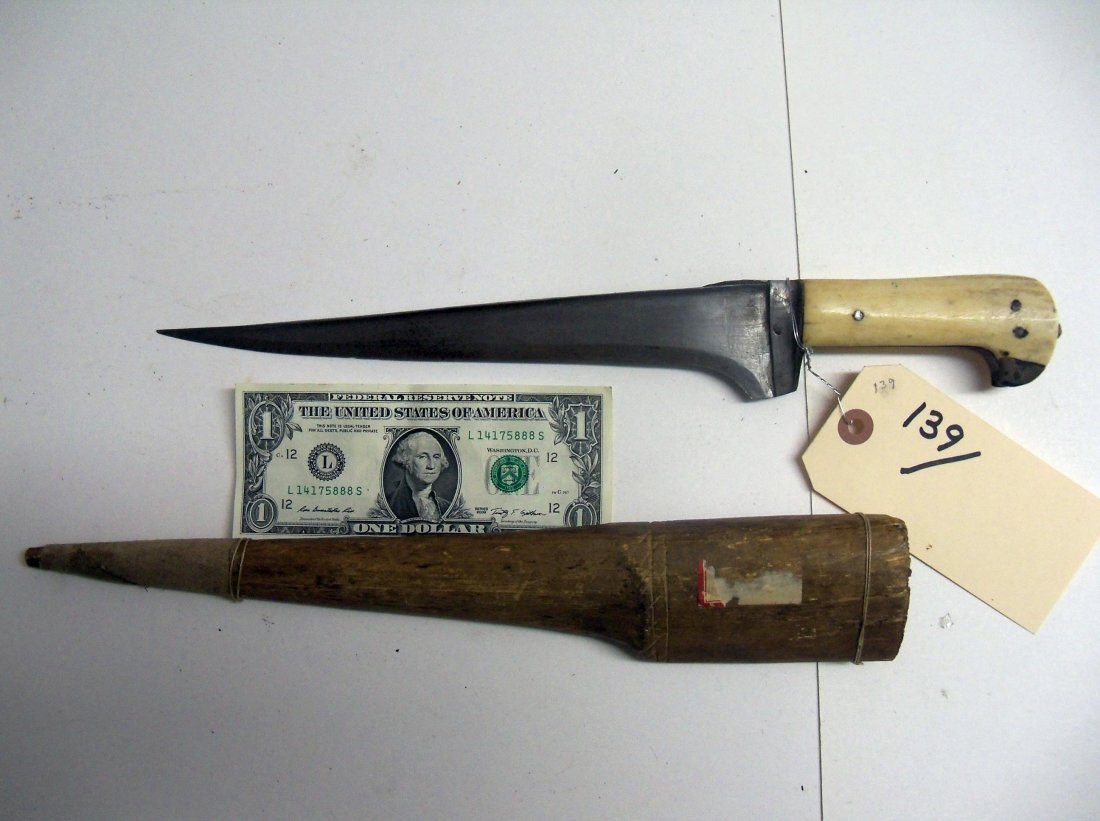 Antique Pesh Kabz Dagger: Typical form with T-section 10 inch blade and "step" below the grip. A commomform of sheath with the hilt sitting well into the mouth of the wood scabbard in the Afghan or Khyber style. The William He