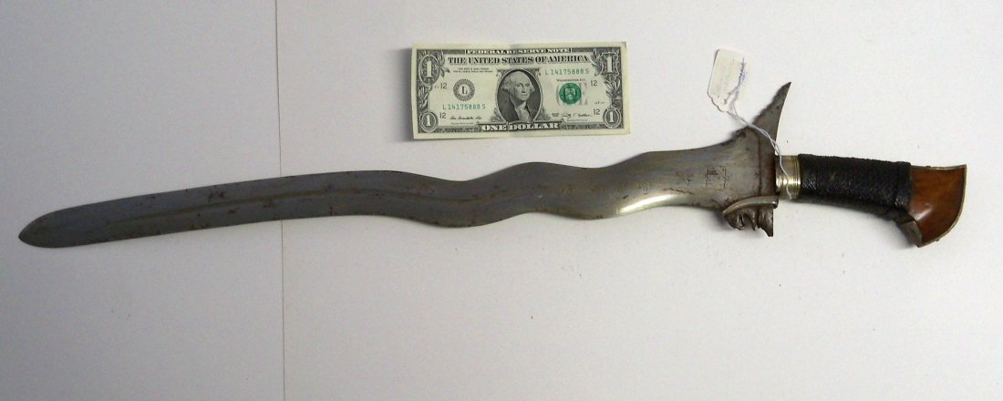 Fine Antique 19th Century Indonesian Kris Dagger or: 21Â¼ inch engraved blade. Grip is wrapped cord, with silver and finely grained wood. The William Herbert McGinty Collection. Collected between the late 1800's and early 1900's.
