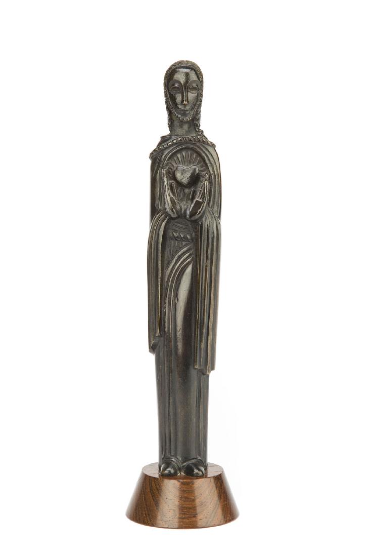 Jean Lambert-Rucki (1888 - 1967), The Burning Heart of: Jean Lambert-Rucki (1888 - 1967), The Burning Heart of Jesus; bronze, 25 x 6 cm, signed on the revers: 'LAMBERT-RUCKI'; wooden base; NOTE: - To this lot we apply 'artist's resale right' ('droit de sui