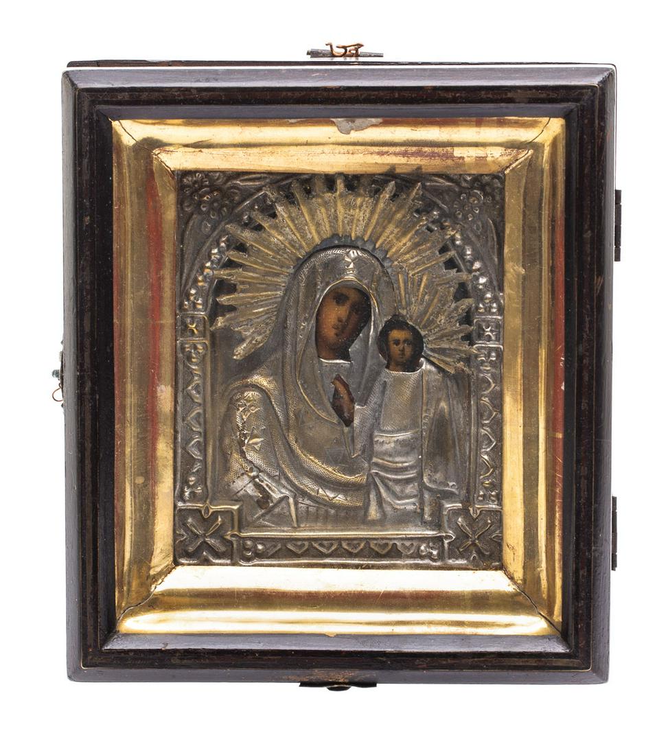 The Kazanskaya Icon of the Mother of God: 19th/20th Century Russia tempera/glass wood board brass icon dimensions: 136 x 113 cm dimensions with the kiot: 192 x 17 cm CONDITION: defects in the frame NOTE: - In addition to the hammer price the 