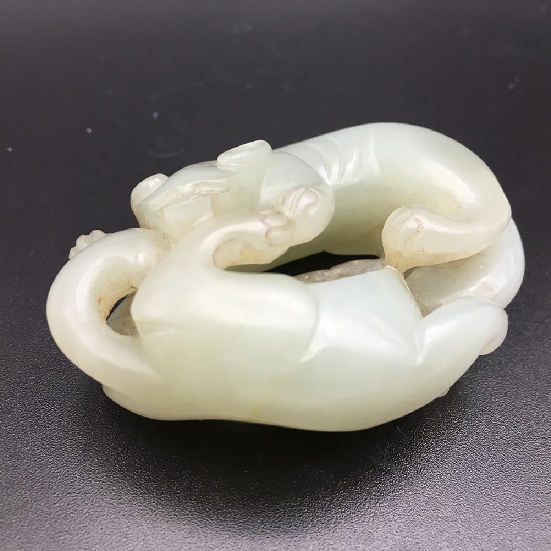 A CHINESE WHITE JADE BADGERS' GROUP (1 of 3)