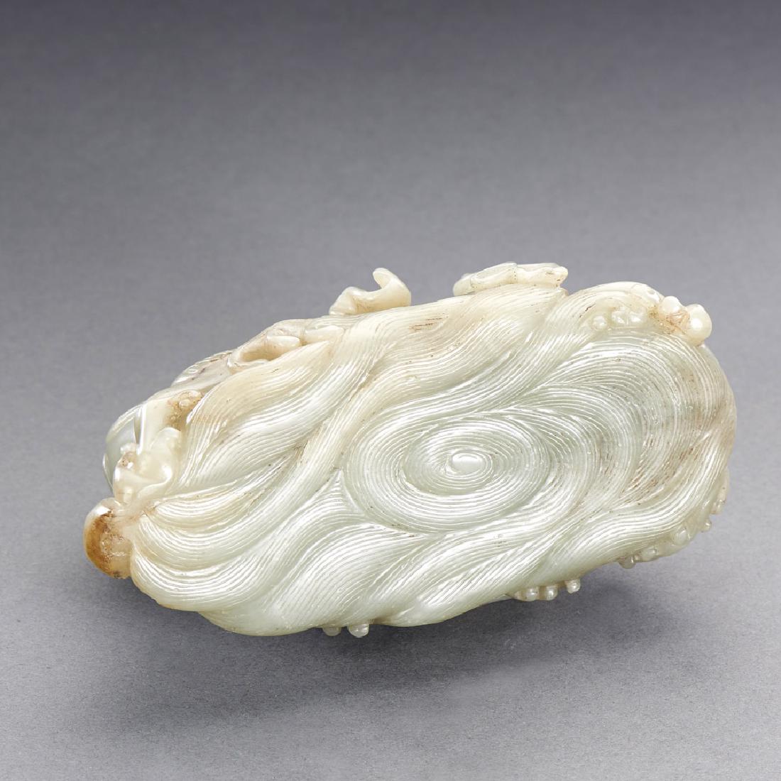 A CHINESE WHITE JADE HORSE CARRYING A BOOK (1 of 3)