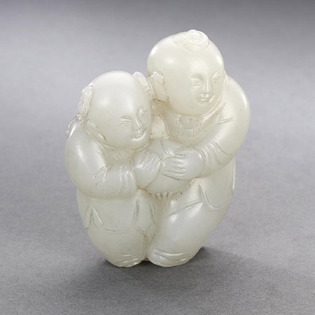 A CHINESE WHITE JADE CARVING OF BOY GROUP (1 of 4)