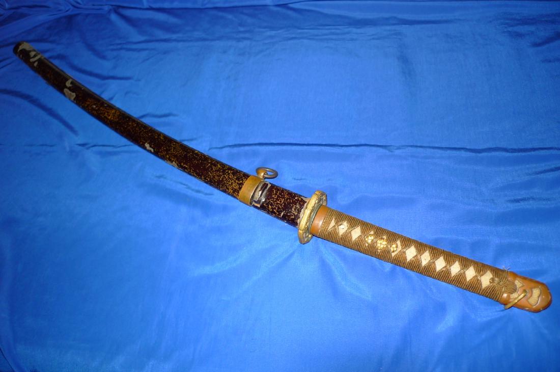 WWII Japanese Army Samurai Officer Sword singed: WWII Japanese Army Samurai Officer Sword singed WW2 Japanese Officers Sword Type 98 Shin-Gunto Signed - Seki Ju Tanigawa Ichishin Sho stamp The cutting edge measures 25 1/4"