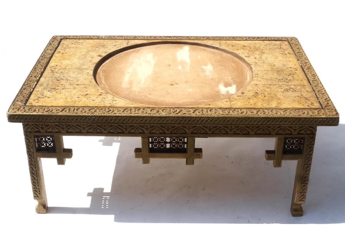 Antique Middle Eastern Incised Decorated Low Table: Antique Middle Eastern Incised Decorated Low Table Antique Middle Eastern Incised Decorated Low Table. Missing the center insert. Dimensions: 47" W x 31" D x 19.75"H; CONDITION Good condition as with