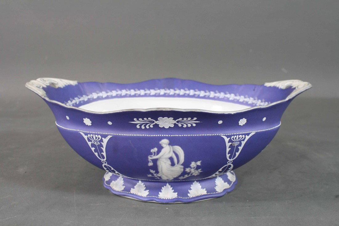 Signed "Noritake - Japan" Wedgewood Decorated 2 Ha: Signed "Noritake - Japan" Wedgewood Decorated 2 Handled Centerpiece w/ Allover Figural + Floral Decoration Very good condition 4.8" high 12.5" wide