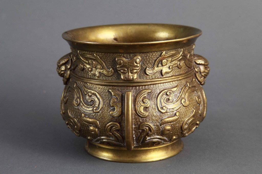 Chinese Qing Bronze Censer: Chinese Qing bronze censer with fine casting taoti mark. Hall mark on the bottom "Hu Wen Ming" Condition: Available Upon Request Dimension: 3 1/2"H x 4 1/2"Dia.