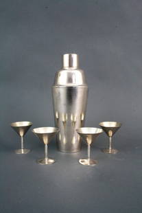 Chinese Silver Shaker Set: Chinese silver shaker set. Mark on bottom saying Yuan Shun Sterling Condition: Available Upon Request Dimension: 9"H