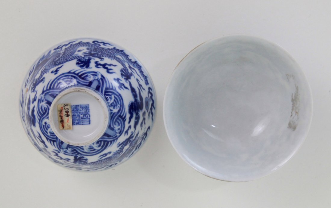Pr of Chinese Blue/White Porcelain Bowl w/ Dragons: Pair of Chinese blue/white porcelain bowl with dragons, QianLong mark Dimension: 2 1/4"H x 4 1/4"Diam