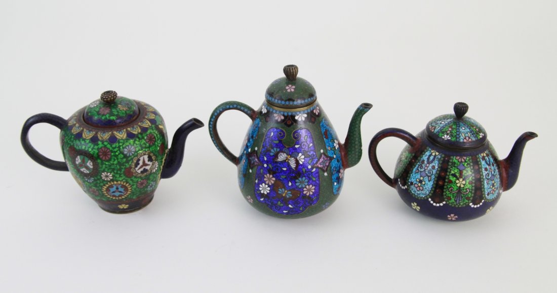 3 Pieces Of Closionne Tea Pot: 3 pieces of cloisonne tea pot Dimension: (1) 5"H x 5"L x 3 1/2"W, (2) 3 3/4"H x 5 1/4"L x 3 1/2"W (3) 4 1/2"H x 6"L x 3 1/2"W