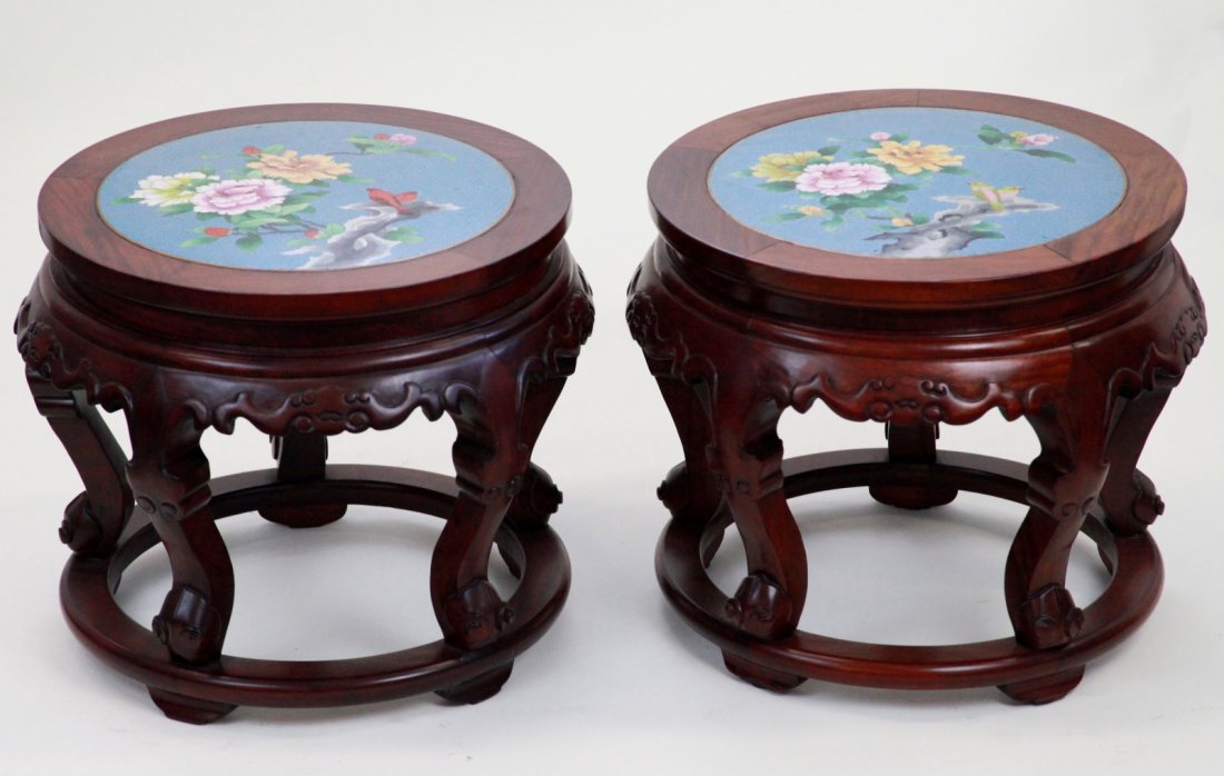 A Pair Of Chinese Hardwo Stools With Cloisonne Top: A pair of chinese Hardwood stools with cloisonne top decorated with flowers and birds Dimension: 14"H x 17"Diam