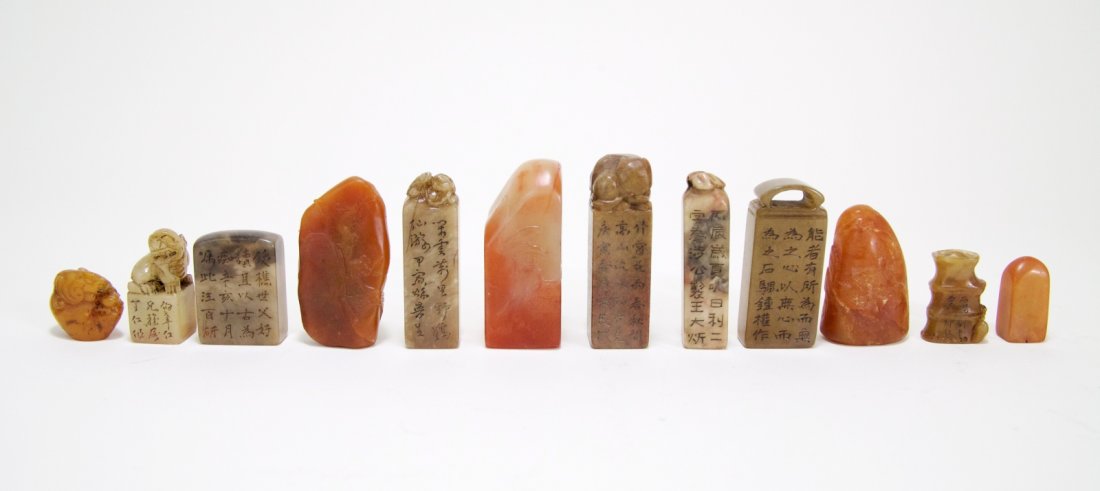 Group of 12 Pieces of Soapstone Seals with Box: Group of 12 pieces of soapstone seals with wood box