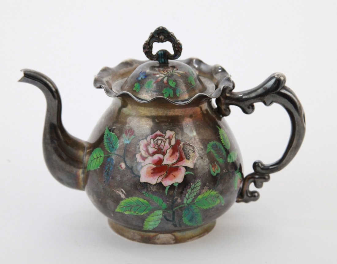 Chinese Silver Teapot with Color Enamel: Chinese silver teapot with color enamel Dimension: 5 1/2"H x 7 1/4"W