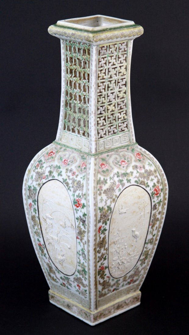 19th C. Large Famille Verte Vase: 19th C. large famille verte vase of square baluster form with tall reticulated neck, each side of the body reserved with an oval moulded biscuit panel of birds and foliage within surrounds of bats amo