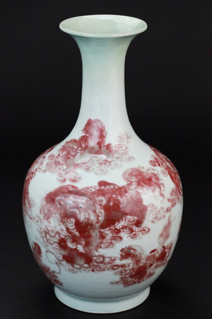 Early 18th C. Underglaze-Copper-Red Vase: Early 18th C. Chinese underglaze-copper-red and white vase with oviform body and tall neck with flaring mouth, decorated in underglaze copper-red with numerous Buddhist Lions and cubs, their eyes pick