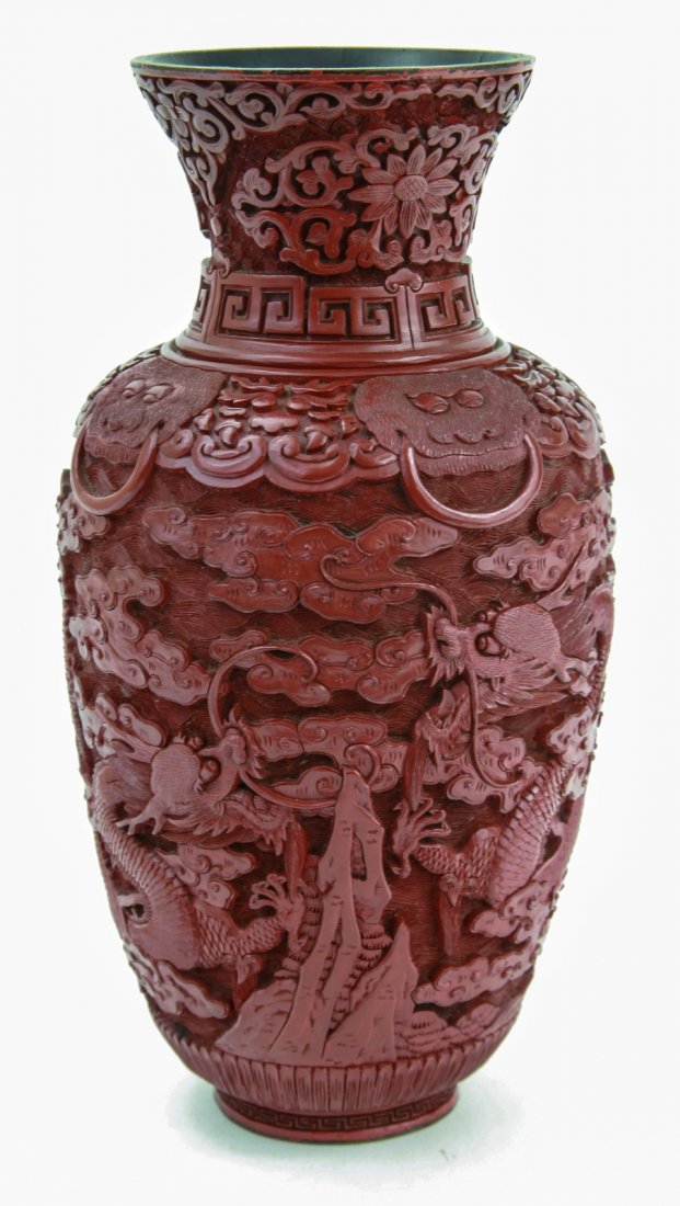 Chinese Republic Pd Red Cinnabar Lacquer Vase: Chinese Republic period red cinnabar lacquer vase, carved with dragons amongst clouds Dimension: 10"H