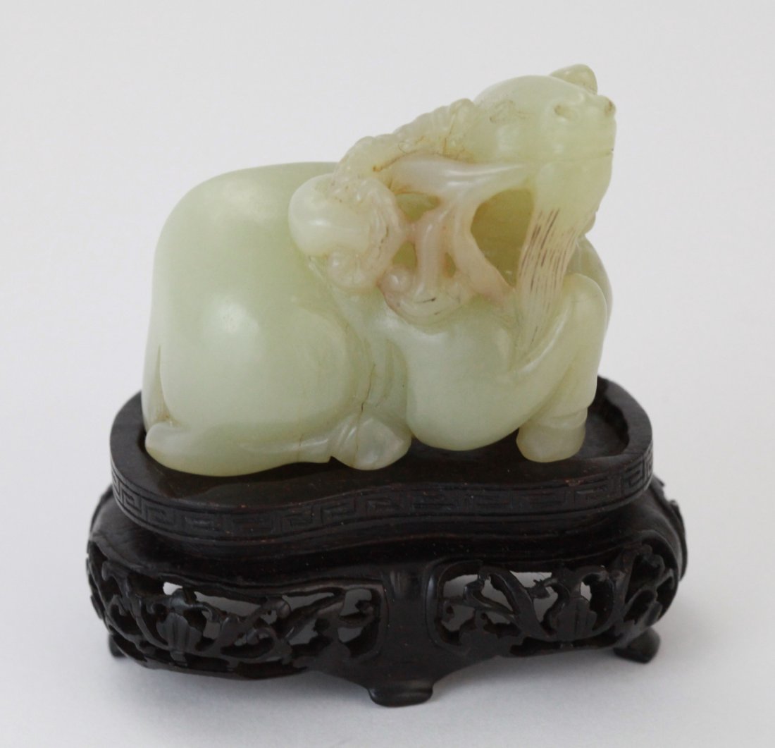 Chinese Jade Carved Ram Hold Ling Zhi: Chinese jade carved ram hold Ling Zhi with wood base Dimension: 2 3/4"H (with stand) 1 3/4"H (without stand)