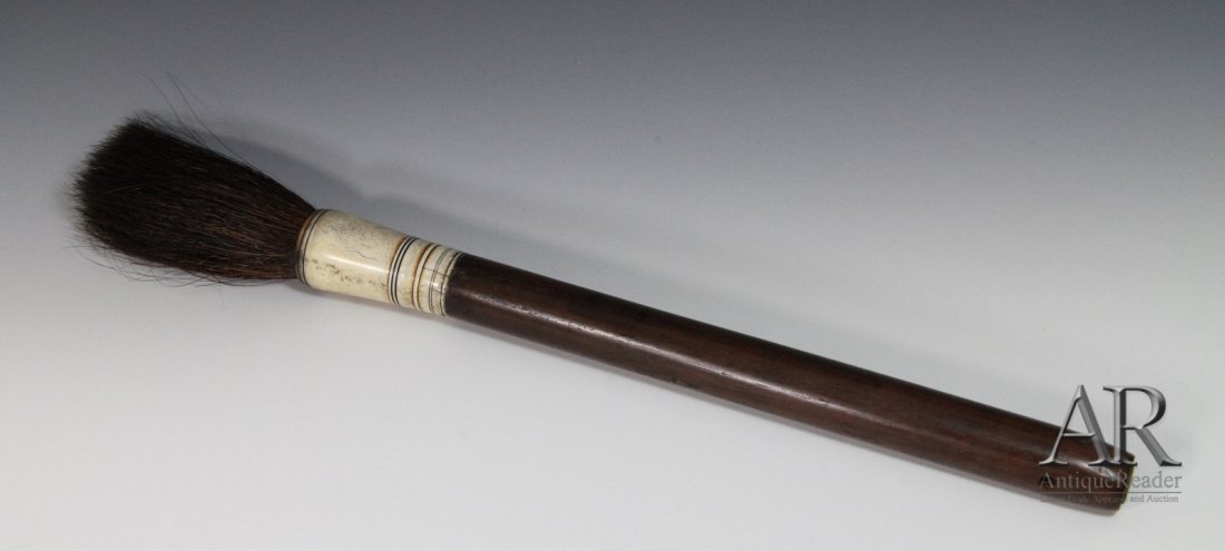 19th Century Chinese Calligraphy Brush: 19th Century Chinese Calligraphy Brush with rosewood handle Dimension: 20 3/8"L