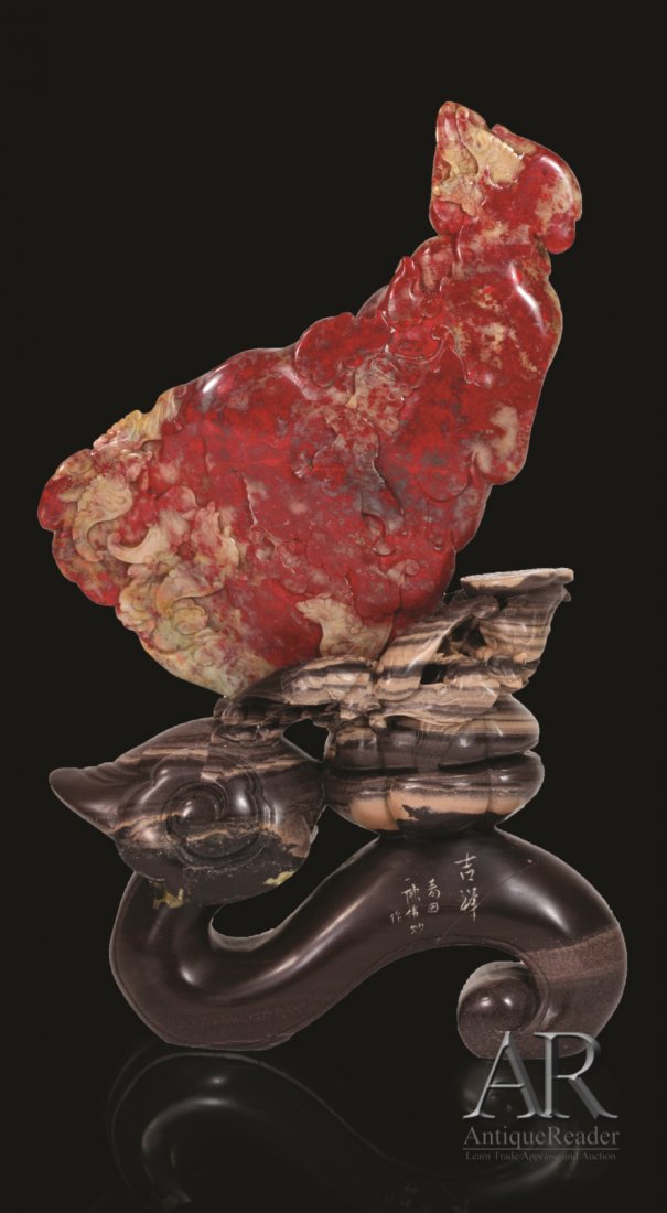Rare Chicken Blood Stone (Jixueshi) of a Rooster: Rare Chinese Chicken Blood Stone (Jixueshi) in a natural shape of a rooster, front side carved in low relief of five bats flying in clouds, back side carved two dragons Dimension: 7 1/4" H (overall); 