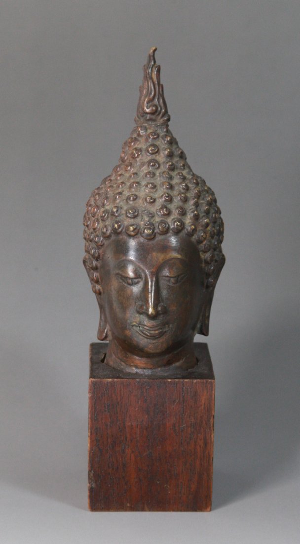 Thai Bronze Buddha Head on Wood Base: Thai Bronze Buddha Head on Wood Base Dimension: 7"H x2 3/4"W (with base)