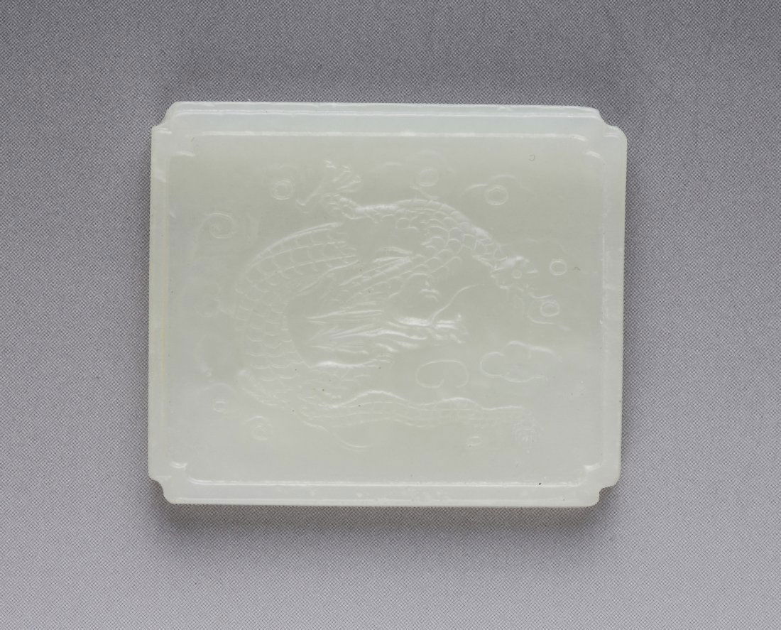 Qing Dynasty White Jade Pendant Carved Dragon: Qing Dynasty White Jade Rectangular Plaque Carved in Low Relief with Dragon Provenance: Important Snuff Bottle and Jade Collection from Mr.Jackson, Massachusetts Dimension: 2"L x 1 3/4"W
