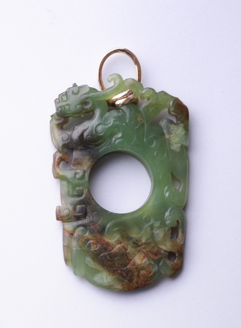 Han Dynasty Spinach Jade Pendant: Han Dynasty Spinach Jade Pendant Provenance: Important Snuff Bottle and Jade Collection from Mr. Jackson, Massachusetts Dimension: 2 1/4"L