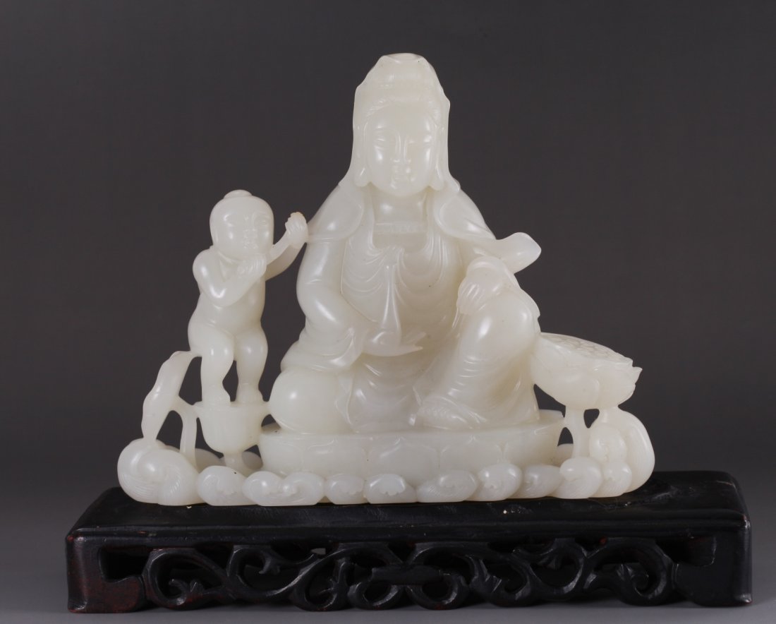 Chinese Jade Carved Seating Guanyin w/ a Boy: Chinese Jade Carved Seating Guanyin w/ a Boy Dimension: 5 7/8"H x 7"W (without stand)