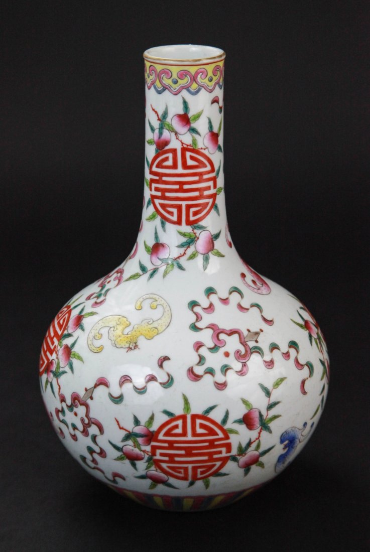Chinese Famille Rose Bottle Vase: Chinese famille rose bottle vase painted with bats and peaches, mark on base Dimension: 8 5/8"H x 5 1/2"Diam