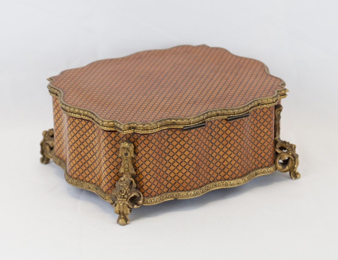 Inlaid Jewelry Box with Marquetry Wood Work: Inlaid Jewelry Box with Marquetry Wood Work with Bronze trim and legs. Interior lined with Silk. Operational key lockDimension: 8"L x 9 1/2"W x 4"H
