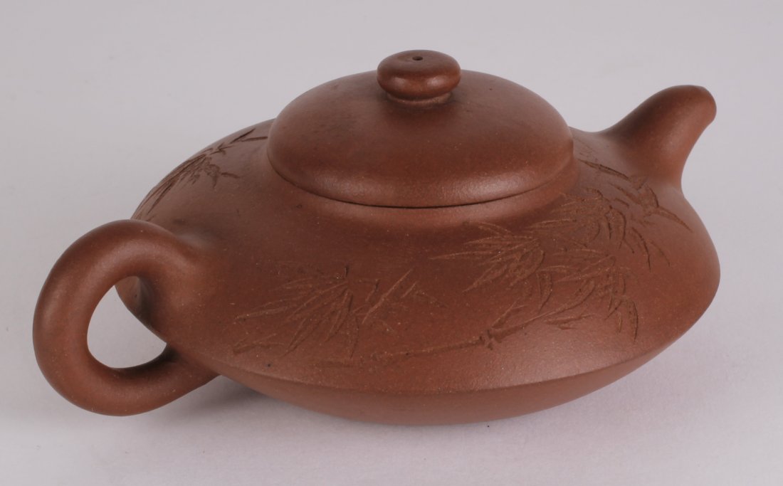 Late Qing Dynasty Yixing Zisha Teapot: Late Qing Dynasty Yixing Zisha Teapot w/ Bamboo Design Dimension: 2 1/4"H x 6'W