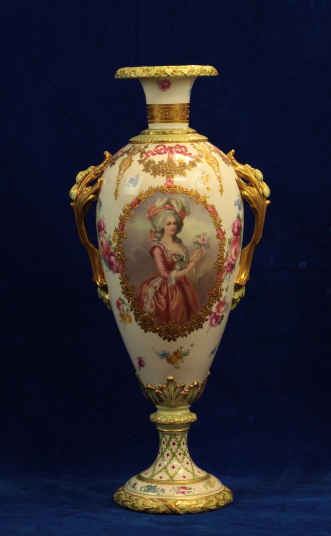 19th C. Royal Bonn Vase- Signed: With hand painted floral scene, portrait of a Dame which is signed lower right and gilded handles. Royal Bonn markings underneath.Dimension: 22 3/8"H